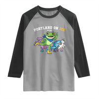 Portland On Ice 2025 Raglan Shirt Resist Frog and Inflatable Animals Protest Sarcastic Politics - Wonder Print Shop