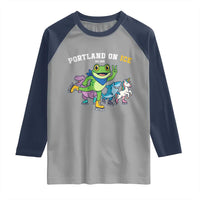 Portland On Ice 2025 Raglan Shirt Resist Frog and Inflatable Animals Protest Sarcastic Politics - Wonder Print Shop