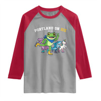 Portland On Ice 2025 Raglan Shirt Resist Frog and Inflatable Animals Protest Sarcastic Politics - Wonder Print Shop
