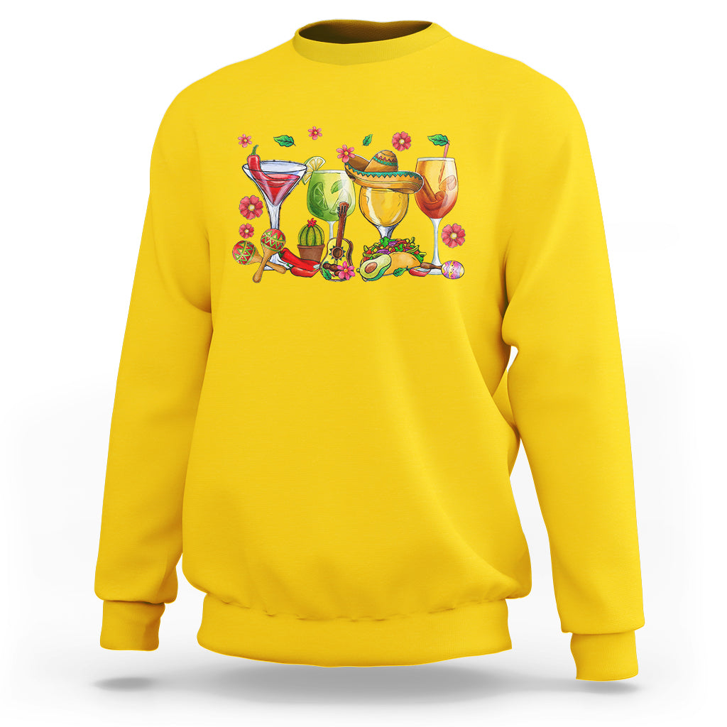 Daisy yellow sweatshirt with colorful fiesta drinks graphic across the chest