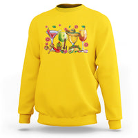 Daisy yellow sweatshirt with colorful fiesta drinks graphic across the chest