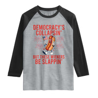 Funny Patriotic Hotdog Cartoon 4th of July Fireworks Raglan Shirt Democracys Collapsin But These Wieners Be Slappin