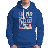 In My Holly Jolly Teacher Era Xmas Groovy Christmas Hoodie - Wonder Print Shop