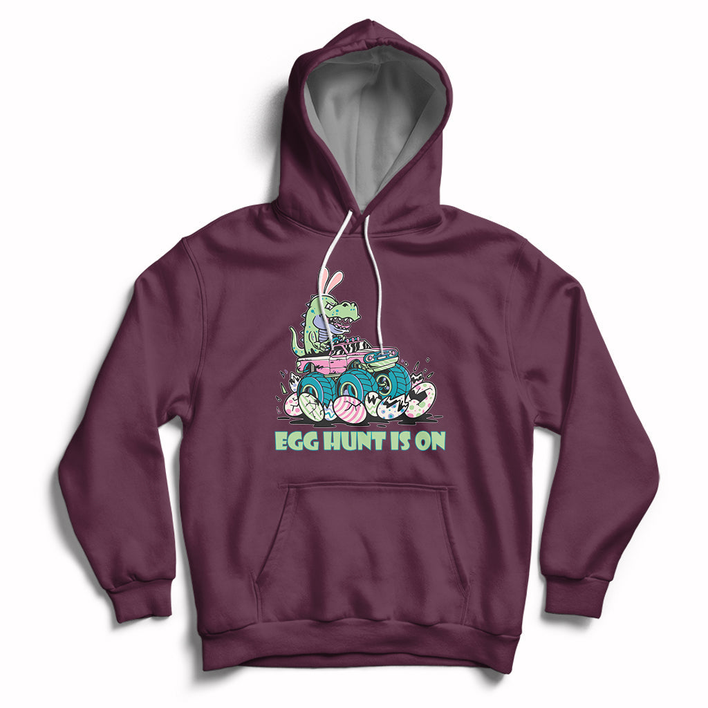 Maroon kids Easter hoodie with bunny-dinosaur graphic and 'EGG HUNT IS ON'