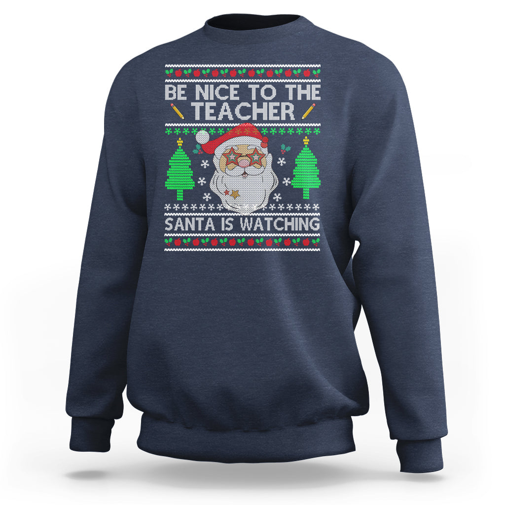 Be Nice To The Teacher Santa Is Watching Claus Ugly Christmas Sweatshirt - Wonder Print Shop