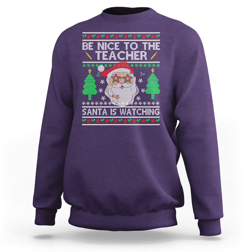 Be Nice To The Teacher Santa Is Watching Claus Ugly Christmas Sweatshirt - Wonder Print Shop