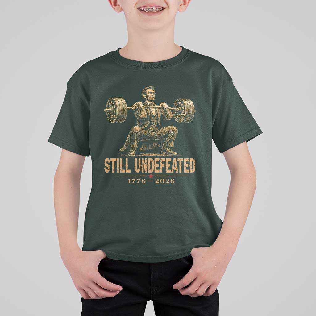 Funny Abraham Lincoln Squatting Barbell Semiquincentennial T Shirt For Kid Still Undefeated 1776 to 2026 Muscular President Gym Bodybuilder