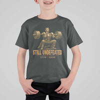 Funny Abraham Lincoln Squatting Barbell Semiquincentennial T Shirt For Kid Still Undefeated 1776 to 2026 Muscular President Gym Bodybuilder
