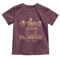 Funny Abraham Lincoln Squatting Barbell Semiquincentennial Toddler T Shirt Still Undefeated 1776 to 2026 Muscular President Gym Bodybuilder
