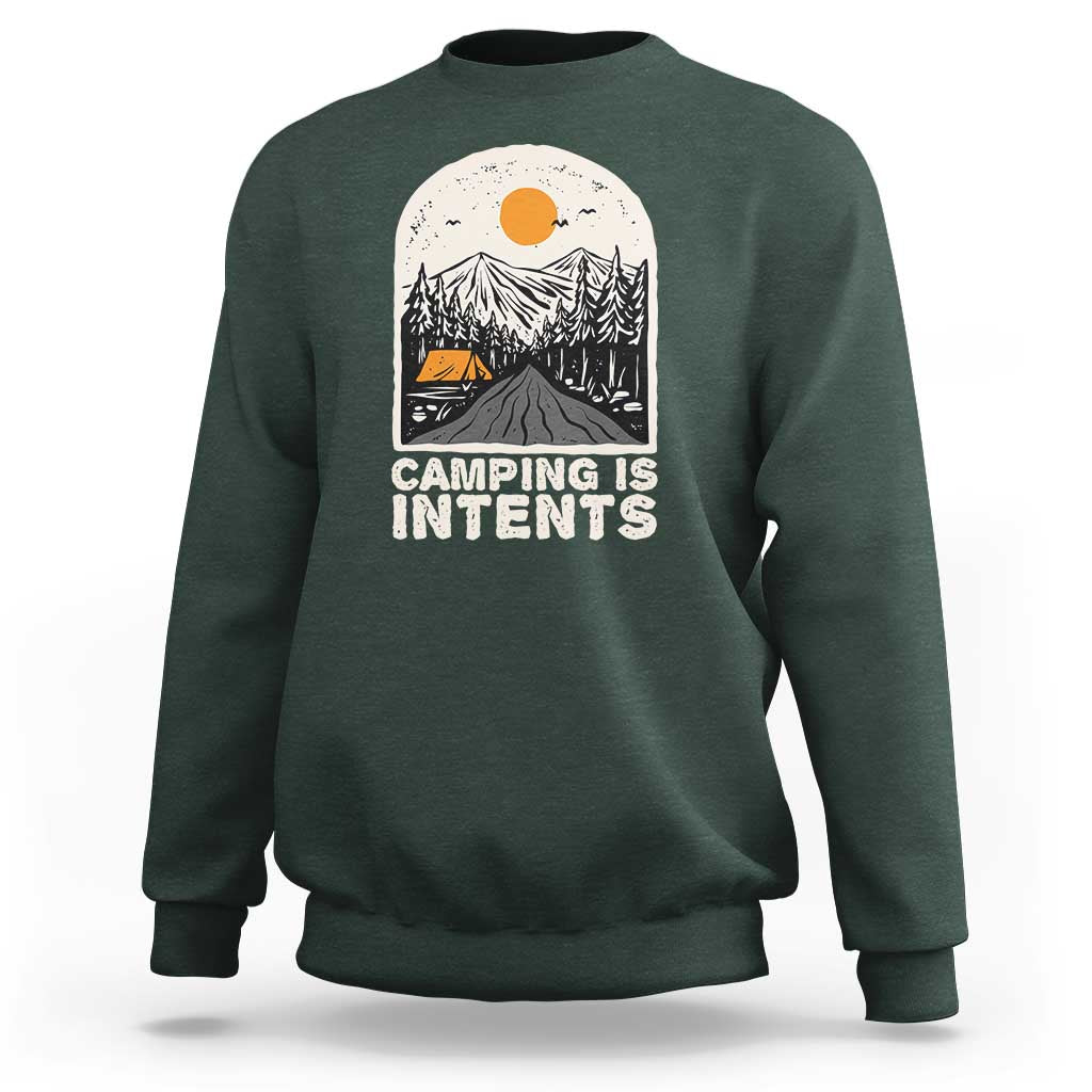 Forest green camping sweatshirt with front graphic reading "Camping Is Intents"