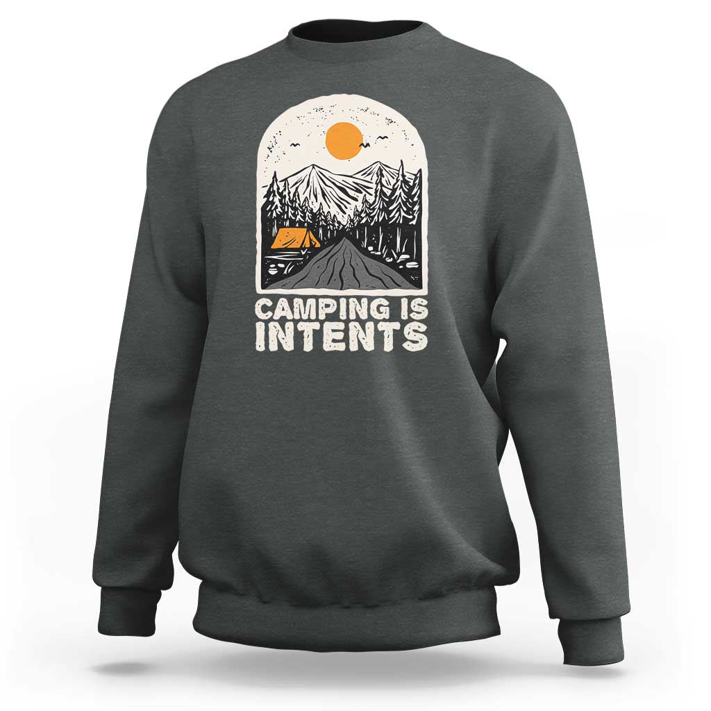 Dark heather camping sweatshirt with front graphic reading "Camping Is Intents"