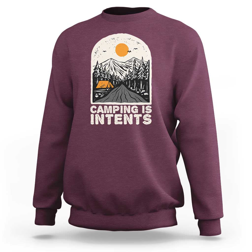 Maroon camping sweatshirt with front graphic reading "Camping Is Intents"