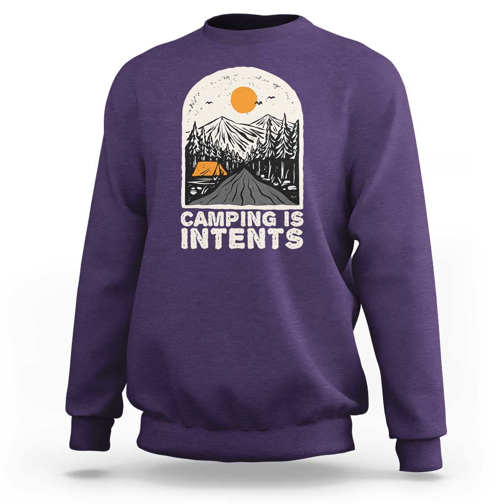 Purple camping sweatshirt with front graphic reading "Camping Is Intents"
