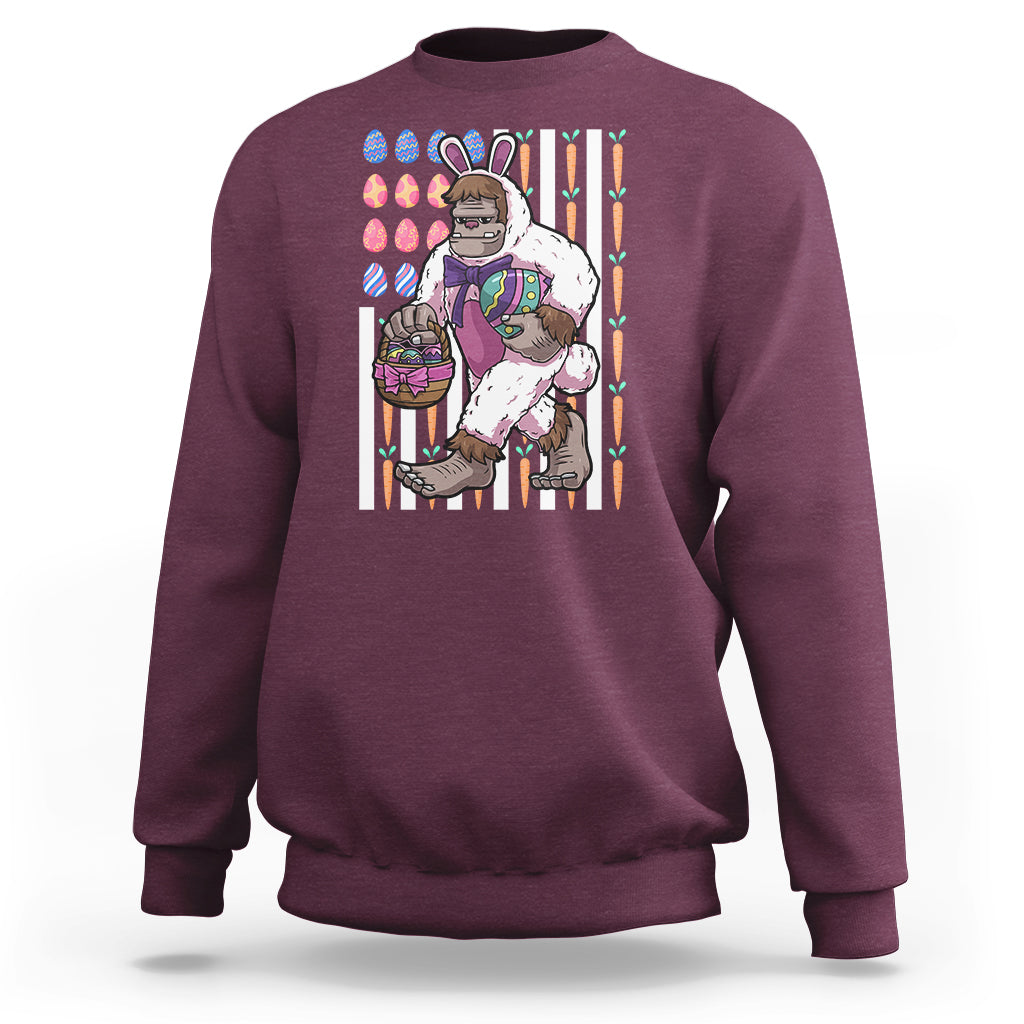 Kids maroon sweatshirt with Bigfoot in bunny costume holding Easter eggs graphic