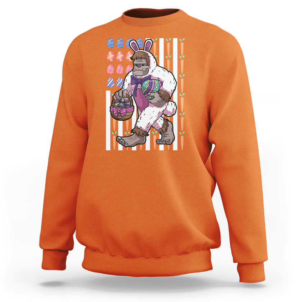 Kids orange sweatshirt with Bigfoot in bunny costume holding Easter eggs graphic