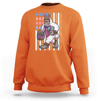 Kids orange sweatshirt with Bigfoot in bunny costume holding Easter eggs graphic