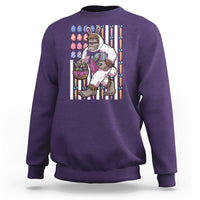 Kids purple sweatshirt with Bigfoot in bunny costume holding Easter eggs graphic