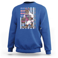 Kids royal blue sweatshirt with Bigfoot in bunny costume holding Easter eggs graphic