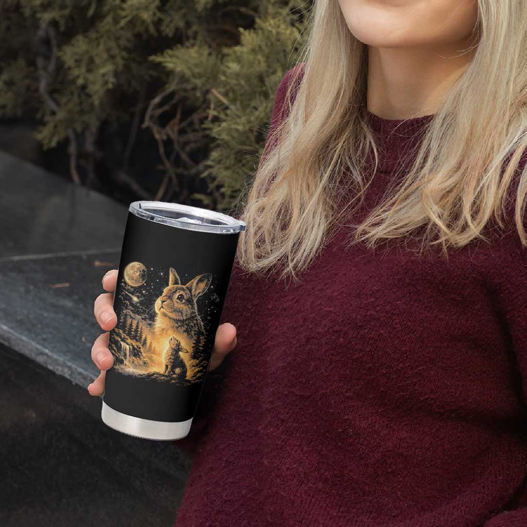 Mystical Moonlit Bunny Graphic Tumbler Cup Glowing Rabbit Under Full Moon Waterfall Nature Scene