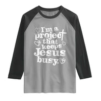 I am a Project That Keeps Jesus Busy Funny Christian Typography Raglan Shirt Faith Humor Inspirational Gift