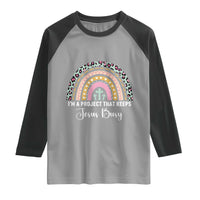 I am a Project That Keeps Jesus Busy Rainbow Cross Raglan Shirt Cute Christian Faith Humor