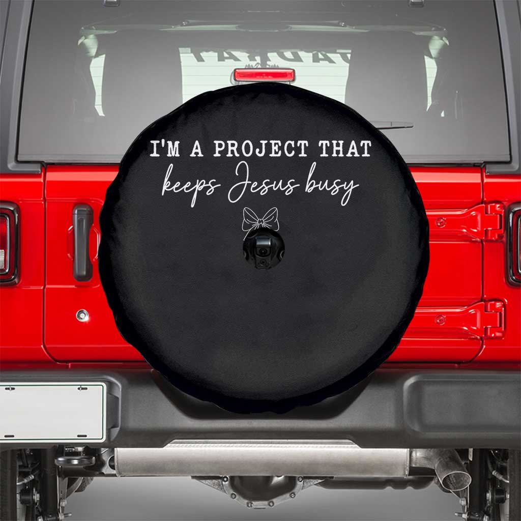 I am a Project That Keeps Jesus Busy Coquette Bow Spare Tire Cover Christian Faith Humor