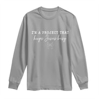 I’m a Project That Keeps Jesus Busy Coquette Bow Long Sleeve Shirt Christian Faith Humor