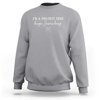 I am a Project That Keeps Jesus Busy Coquette Bow Sweatshirt Christian Faith Humor