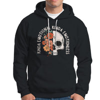 Black pullover hoodie with white drawstring and floral skull graphic on chest.