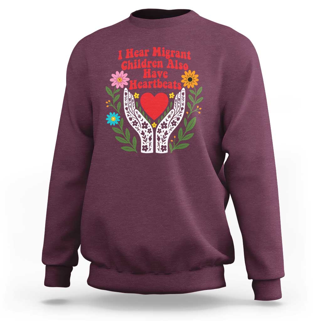 I Hear Migrant Children Also Have Heartbeats Sweatshirt Groovy Retro Floral Hands Heart Social Justice