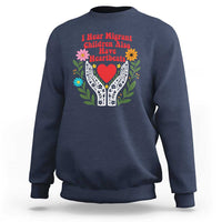 I Hear Migrant Children Also Have Heartbeats Sweatshirt Groovy Retro Floral Hands Heart Social Justice