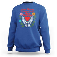 I Hear Migrant Children Also Have Heartbeats Sweatshirt Groovy Retro Floral Hands Heart Social Justice