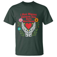 I Hear Migrant Children Also Have Heartbeats T Shirt Groovy Retro Floral Hands Heart Social Justice