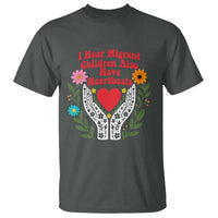 I Hear Migrant Children Also Have Heartbeats T Shirt Groovy Retro Floral Hands Heart Social Justice