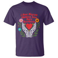 I Hear Migrant Children Also Have Heartbeats T Shirt Groovy Retro Floral Hands Heart Social Justice