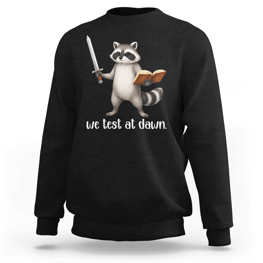 We Test At Dawn Raccoon Warrior Sweatshirt Funny Student Teacher Exam Motivation