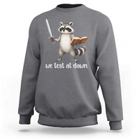 We Test At Dawn Raccoon Warrior Sweatshirt Funny Student Teacher Exam Motivation