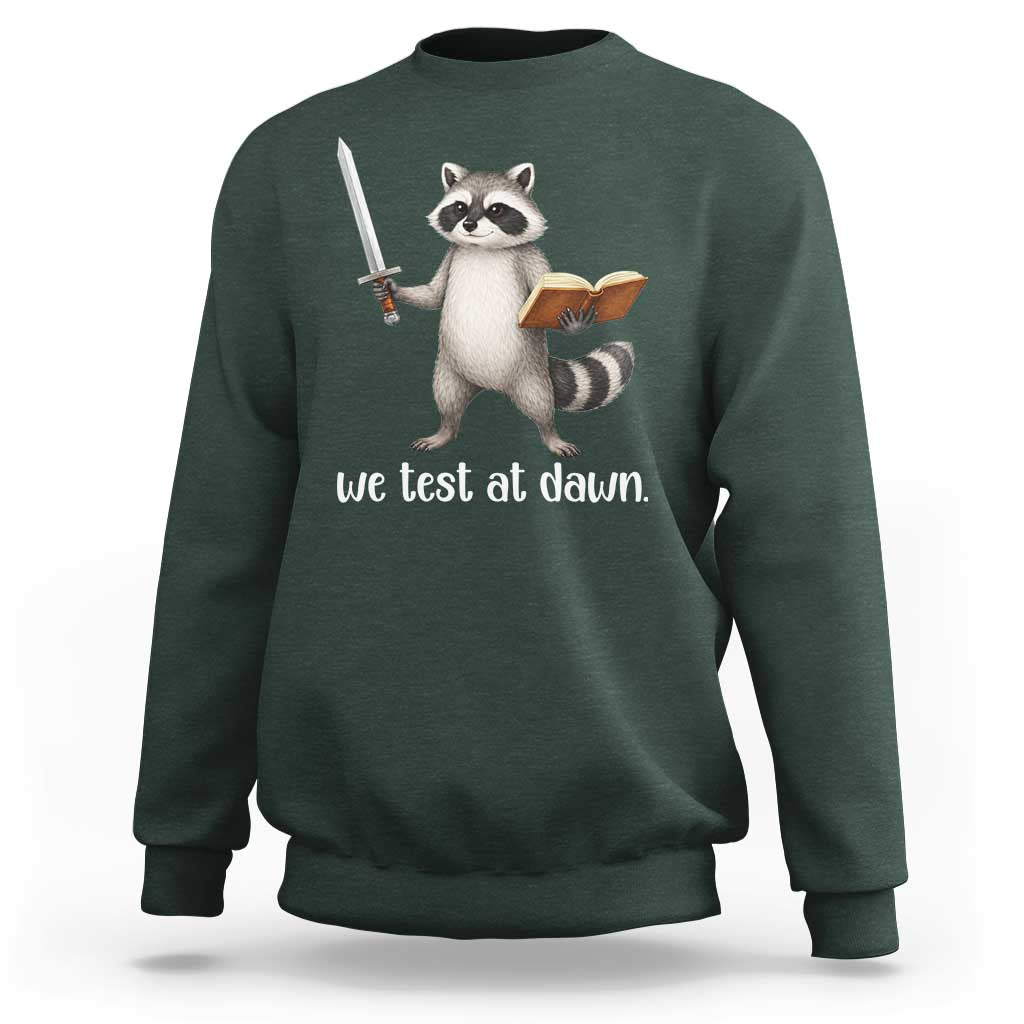 We Test At Dawn Raccoon Warrior Sweatshirt Funny Student Teacher Exam Motivation