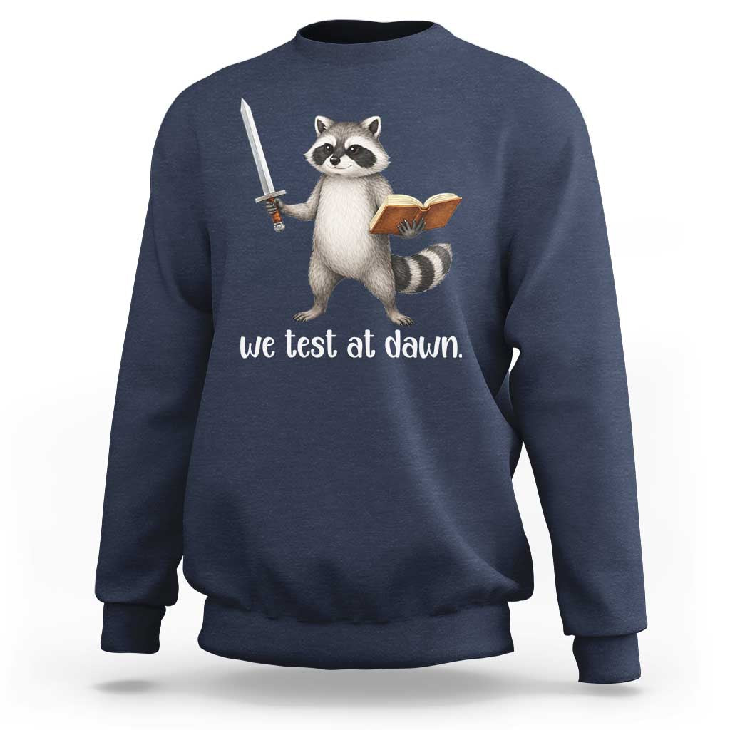 We Test At Dawn Raccoon Warrior Sweatshirt Funny Student Teacher Exam Motivation