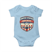 Hockey Crossed Sticks And Puck Retro USA Shield Flag Baby Onesie Red White Blue Striped Patriotic Sports Fan Pride Graphic