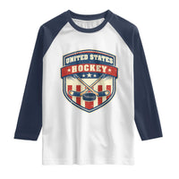 Hockey Crossed Sticks And Puck Retro USA Shield Flag Raglan Shirt Red White Blue Striped Patriotic Sports Fan Pride Graphic