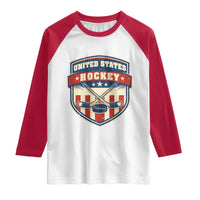 Hockey Crossed Sticks And Puck Retro USA Shield Flag Raglan Shirt Red White Blue Striped Patriotic Sports Fan Pride Graphic
