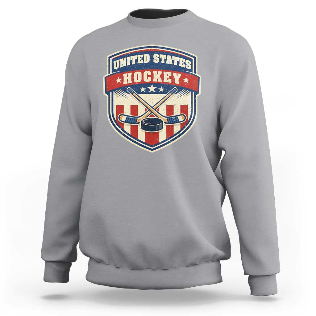 Hockey Crossed Sticks And Puck Retro USA Shield Flag Sweatshirt Red White Blue Striped Patriotic Sports Fan Pride Graphic