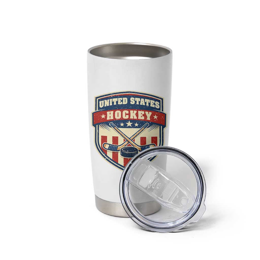 Hockey Crossed Sticks And Puck Retro USA Shield Flag Tumbler Cup Red White Blue Striped Patriotic Sports Fan Pride Graphic