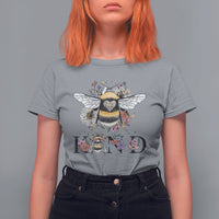Women's gray crewneck t-shirt with bee-and-floral retro graphic and BE KIND print