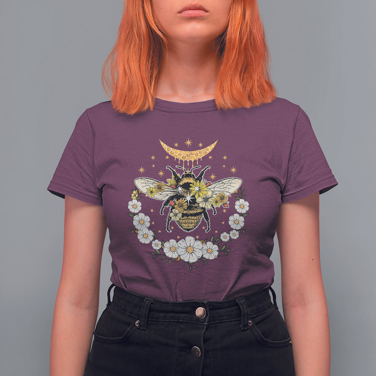 Purple crew-neck women’s t-shirt with bee, crescent moon, and floral wreath graphic
