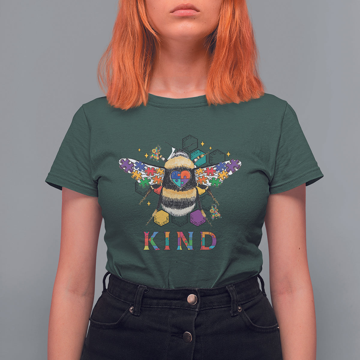 Dark forest green bee graphic T-shirt with KIND text and a colorful winged bee character.
