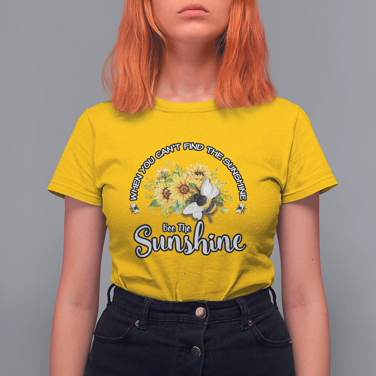 Yellow women’s T-shirt with sunflower and bee graphic, “Bee The Sunshine” slogan