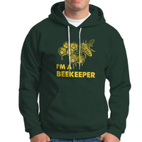 Dark forest green hoodie with front beehive and bee graphic, text "I'M A BEEKEEPER"