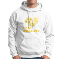 White hoodie with front beehive and bee graphic, text "I'M A BEEKEEPER"